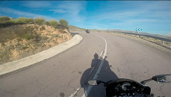 Motorcycles riding in a corner