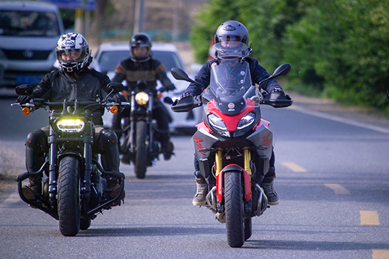 Motorcycles riding in a group