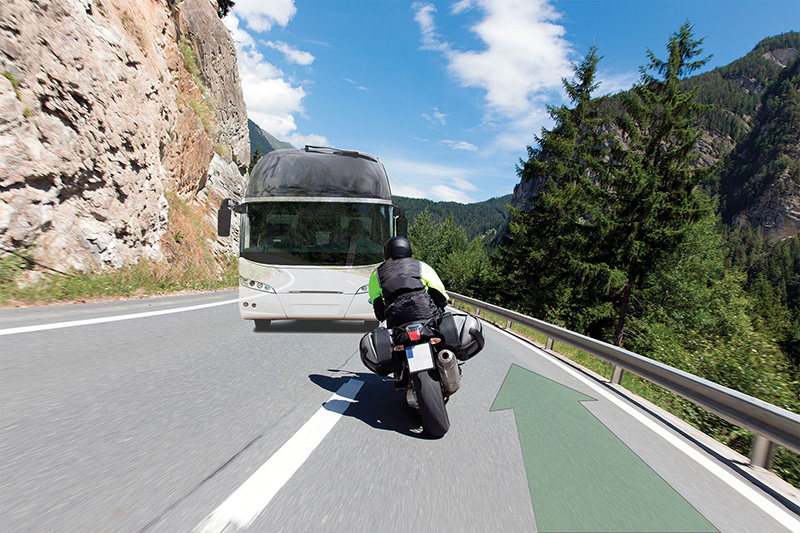 Motorcycle cornering green arrow ponting the correct riding line