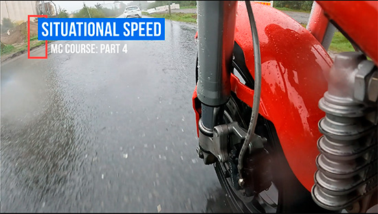 Motorcycle riding in rain
